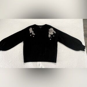 NWOT Black sweater with rhinestones.
